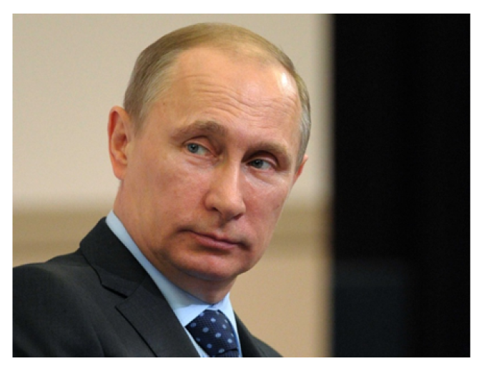 Anexo 1: En esta fotografía se observa al Presidente de Rusia: Vladimir Putin Obtenida de: http://static3.businessinsider.com/image/534d72cb69bedd745a106b05/putin-finally-admits-to-sending-troops-to-crimea.jpg